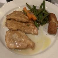 Chicken Francaise · Lemon sauce with pinot grigio white wine.