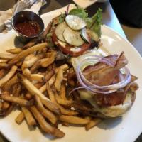 Grilled Chicken Sandwich · All-natural chicken breast, bacon, mixed greens, tomato, house-made pickles, red onion, avoc...