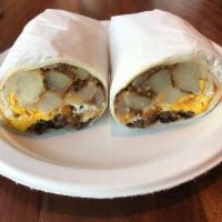 Steak and Egg Wrap · Grilled filet Mignon tips, egg, cheddar and hash browns.