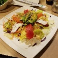 Sashimi Salad · Salmon, tuna, octopus, avocado and cucumber.