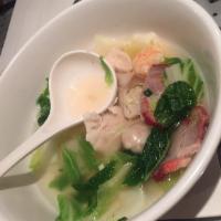 Wor Wonton Soup · Pork and shrimp dumplings topped with BBQ pork, chicken, prawns and vegetables. 