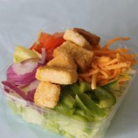 Garden Salad · Fresh cut Iceberg lettuce with tomatoes, red onions, green peppers, cheddar cheese and choic...