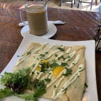 Chipotle Fried Egg Crepe · Fresh spinach, tomatoes, mozzarella cheese, bacon. Topped with 2 organic fried eggs and chip...