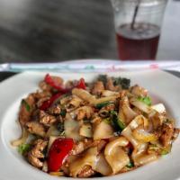 Drunken Noodle · Pan-fried flat noodles with chili, garlic, bell pepper, onion and basil.