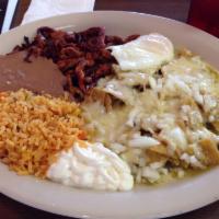 Chilaquiles · Cut of tortilla fried with egg and beef fajita or chicken fajita in our special red or green...