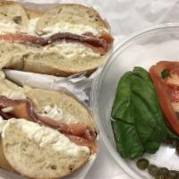 Lox Sandwich · Plain cream cheese, tomatoes, capers and fresh basil leaves.