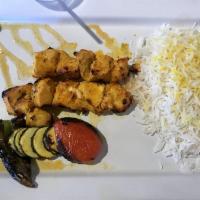 Chello Doh Combo · Your choice of 2 kabobs and 2 sides served with grilled veggies, Persian rice, and a piece o...