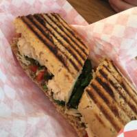 Chicken Pesto Sandwich · Sliced chicken breast, pesto sauce, roasted red peppers, spinach and provolone.