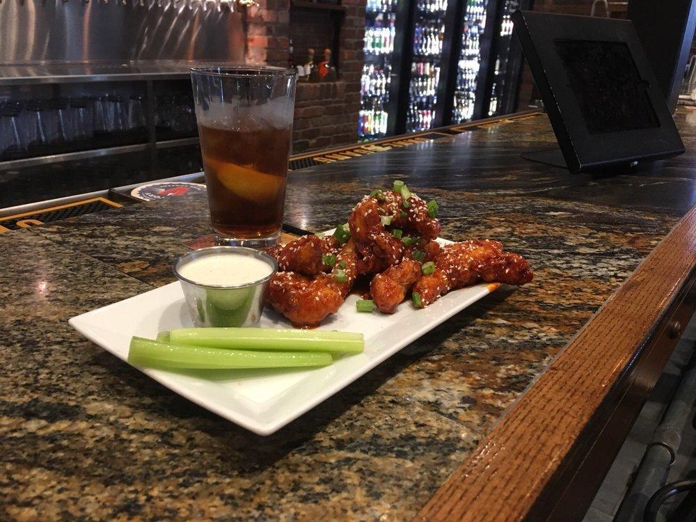 Boneless Wings · Hand-breaded, crisp chicken breast tenders served with celery and your choice of house-made blue cheese or ranch.