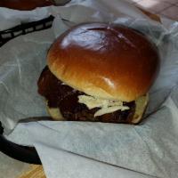 Bluff City Burger · 6 oz pattie. Topped with provolone, home made slaw, candied bacon and BBQ.