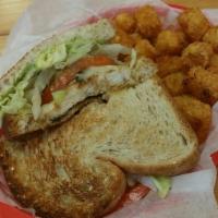 Chik Sammie · Blacken chik topped with Swiss, lettuce, tomato and avocado ranch spread.
