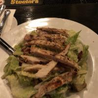 Caesar Salad · Romaine, hickory bacon, chopped red onion, multigrain croutons, shaved 3-cheese blend, Roman...