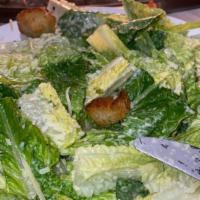 Classic Caesar Salad · Crisp romaine leaves, parmesan, croutons & caesar dressing.