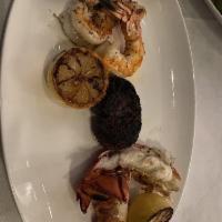 Petite Lobster Tail Trio · Shaved broccoli & kale slaw, caper herb sauce, blistered tomatoes.3 petite cold water lobste...