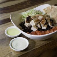 Latin Chop · Chopped grilled chicken breast, choice of rice, lettuce, tomatoes, black beans and pita. Ser...