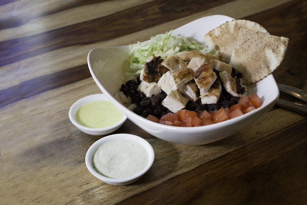 Latin Chop · Chopped grilled chicken breast, choice of rice, lettuce, tomatoes, black beans and pita. Served with your choice of sauce (1 sauce for a small, 2 sauces for a large).