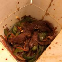 Mongolian Beef · Tender beef strips with sliced bell pepper, onion and carrots stir fried in spicy Mongolian ...