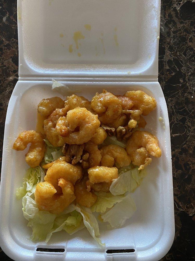 Honey Walnut Shrimp · Crispy shrimp over lettuce glazed with honey walnut sauce, topped with walnuts. 