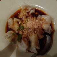 10 Fiery Wontons · Pork filled, red chili oil sauce, scallion and peanut garnish. Spicy.