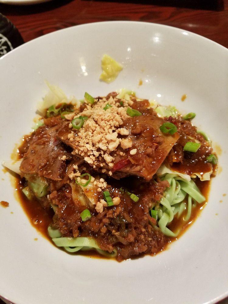 Dan Dan · Chinese veggies, minced pork Sichuan pepper sauce, scallion and peanut garnish. Your choice of noodle. Spicy.