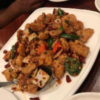 Dry Cooked Chicken · Sauteed with chili and pepper, house special. Spicy.
