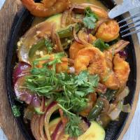 Shrimp Fajitas · Served with fresh flour tortillas, refried beans, rice, pico de gallo, lettuce, guacamole an...