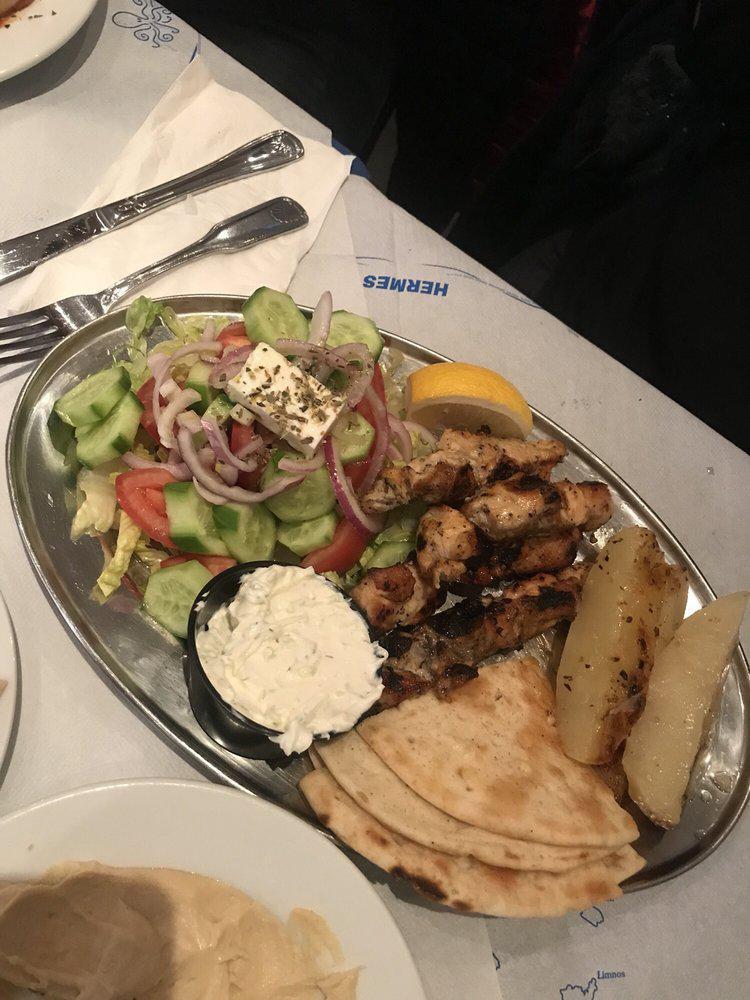 Chicken Souvlaki Platter · Served with Greek salad, pita, tzatziki and your choice of side.
