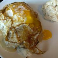 Loco Moco · Marinated beef patties, topped with our special brown gravy and a fried egg. Option to repla...