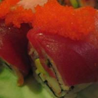 Rainbow Roll · Crab, avocado and cucumber wrap topped with assorted sliced fish.