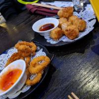 Shumai · Steamed shrimp dumpling served with a ginger garlic soy sauce.