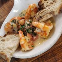 Shrimp Scampi · Sauteed jumbo shrimp tossed with white wine, lemon, butter, fresh basil, and tomatoes. Glute...