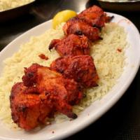 Chicken Tikka · Boneless chicken marinated in yogurt and fresh ground spices then cooked in the tandoor and ...