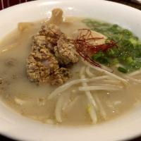 Umami Bowl · Rich and creamy chicken and pork broth topped with chicken, egg, menma, bean sprouts and gre...