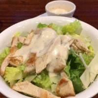 Chicken Caesar Pizza · Grilled chicken, romaine lettuce, croutons, shaved Parmigiana and Caesar dressing.