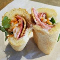 Dac Biet Sandwich · Mixed pork cold cuts, pickled daikon and carrots, cucumber, cilantro, jalapeno, pate, house ...