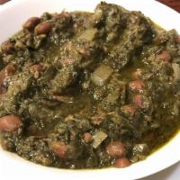 Ghormeh Sabzi · Chopped parsley, corinder and spinach cooked with cubes of beef and red beans.