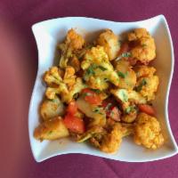 Manchurian Cauliflower · Sauteed in ginger and garlic chili sauce.