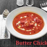Butter Chicken · Grilled chicken chunks in a rich, creamy, garlicky-tomato curry.