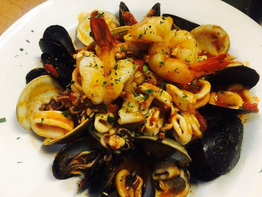 Linguine Pescatore · Shrimp, clams, calamari and mussels in light marinara sauce.