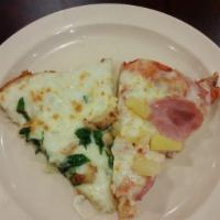 Chicken Spinach Alfredo Specialty Pizza · Dave's Homemade Pizza Crust topped with creamy alfredo sauce, spinach, mozzarella cheese, an...