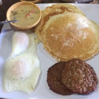 Jumbo Breakfast · 2 buttered pancakes, 2 eggs with your choice of sausage, bacon or ham.