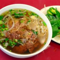 Thin Slices of Steak and Meatball · Comes with rice noodle. Pho tai bo vien.
