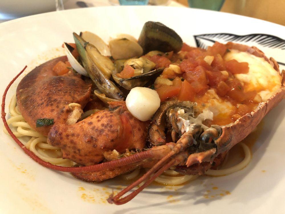 Cioppino · Mixed seafood, shrimp, calamari, clams and mussels in light tomato sauce.