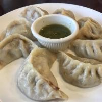 Momo · Dumplings filled with ground beef or tofu and mixed vegetables, soy sauce and house spices. ...