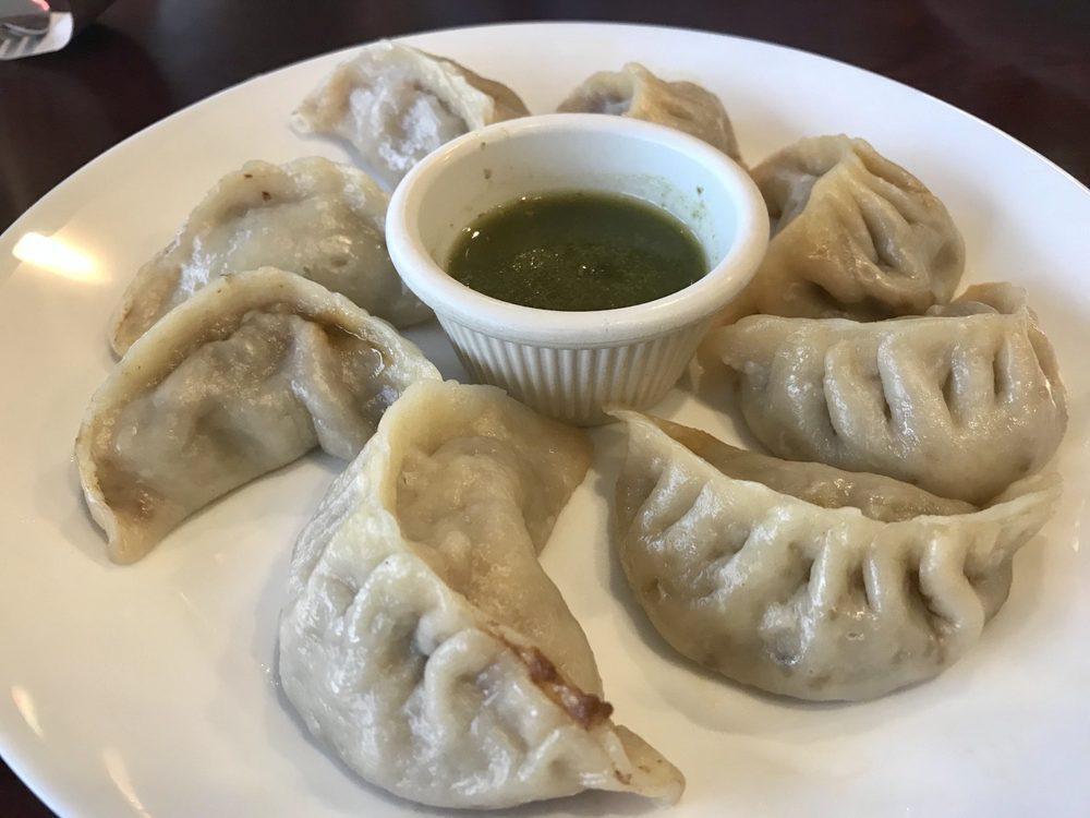 Momo · Dumplings filled with ground beef or tofu and mixed vegetables, soy sauce and house spices. Vegetarian. Vegan.