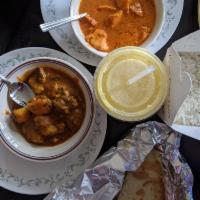 Butter Chicken · Boneless chicken cubes cooked in a rich creamy homemade tomato curry sauce, butter, spices a...