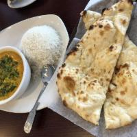 Palak Paneer · Spinach cooked to perfection in a creamy sauce, homemade tomato and onion sauce, Indian pane...