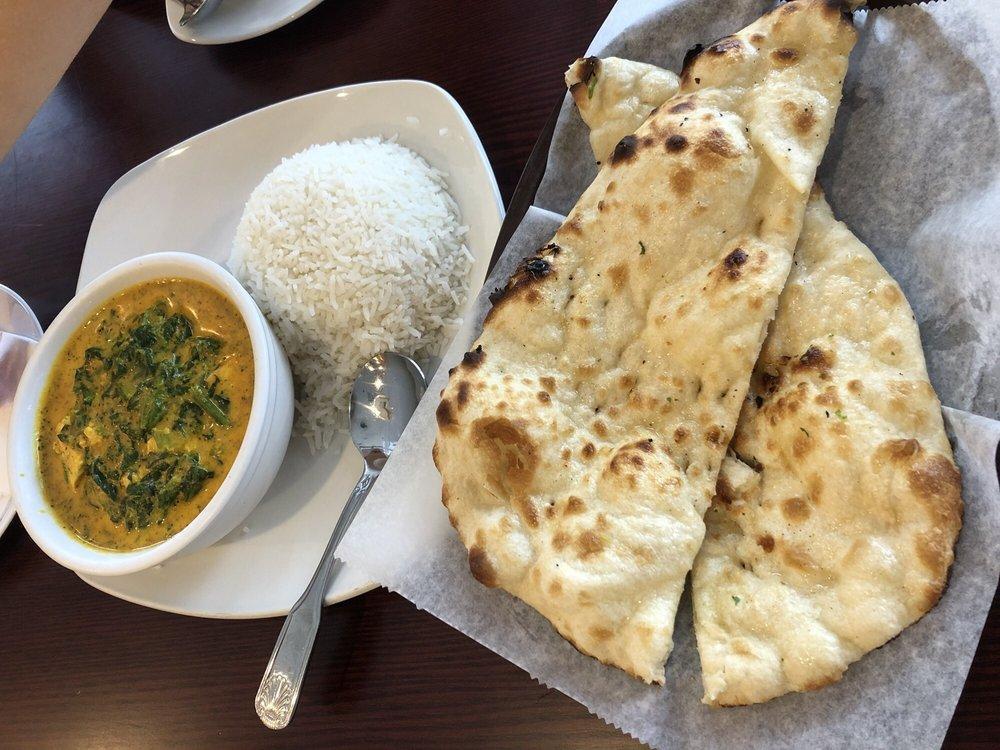 Palak Paneer · Spinach cooked to perfection in a creamy sauce, homemade tomato and onion sauce, Indian paneer cheese. Vegetarian. Gluten-friendly.