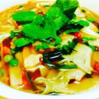 Handmade Noodle Soup · Then-thuk. Homemade traditional flat square noodles, cabbage, carrots and peas, soy sauce, c...