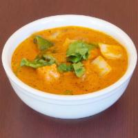 Tikka Masala · Choices of your meat cooked with bell peppers, onions, in a rich creamy homemade tomato and ...
